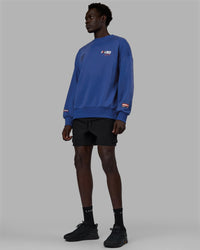 Man wearing Unisex Redline Sweater Oversize - Power Cobalt-White