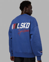 Man wearing Unisex Redline Sweater Oversize - Power Cobalt-White