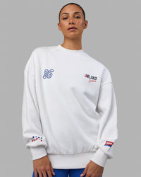 Woman wearing Unisex Redline Sweater Oversize - White-Navy