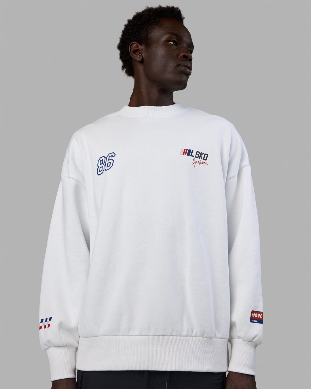Man wearing Unisex Redline Sweater Oversize - White-Navy