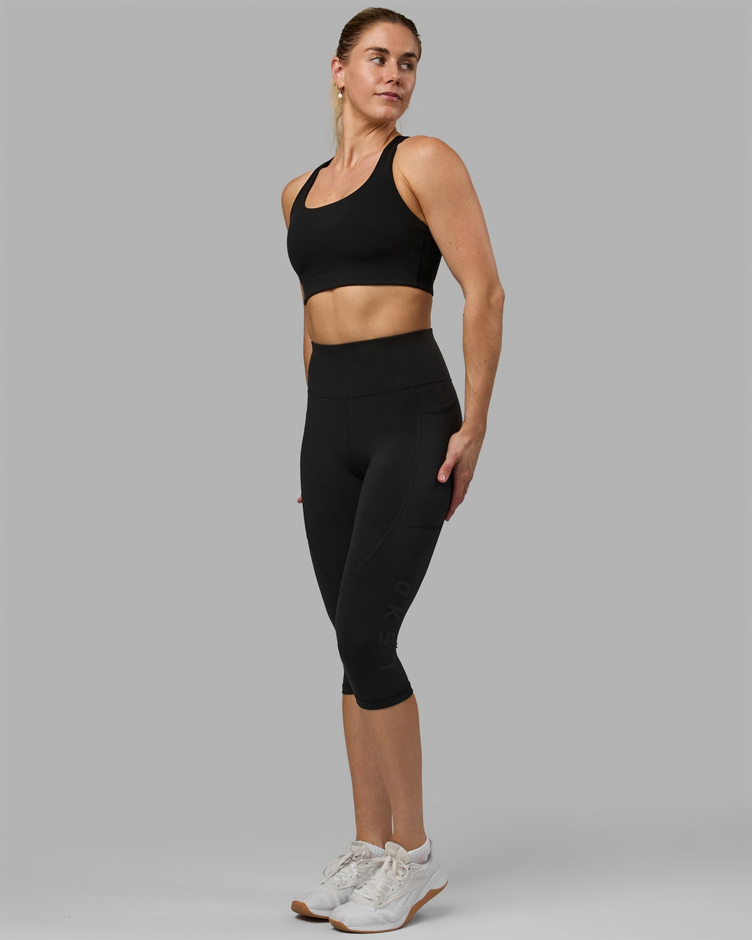 Woman wearing Rep 3/4 Length Leggings - Black-Black