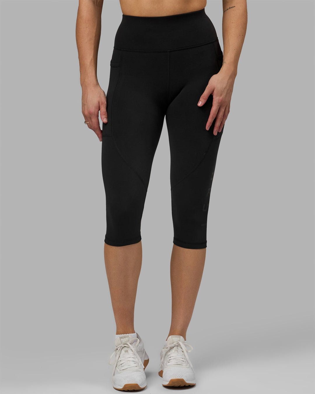 Woman wearing Rep 3/4 Length Leggings - Black-Black