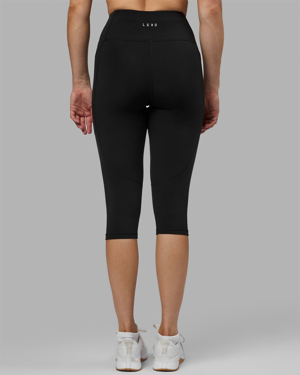 Woman wearing Rep 3/4 Length Leggings - Black-Black