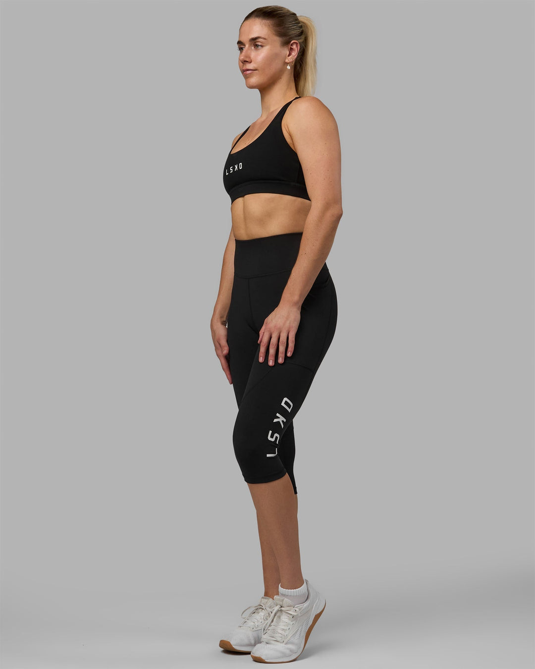 Woman wearing Rep 3/4 Length Leggings - Black-White