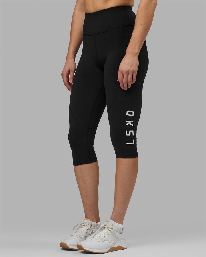 Woman wearing Rep 3/4 Length Leggings - Black-White
