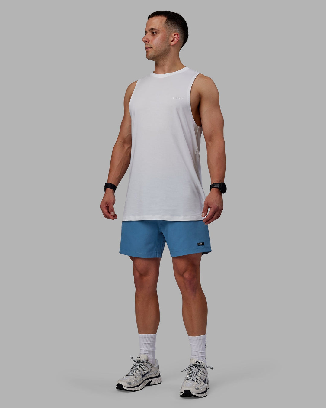 Man wearing Rep 5&quot; Lined Performance Shorts - Elemental Blue