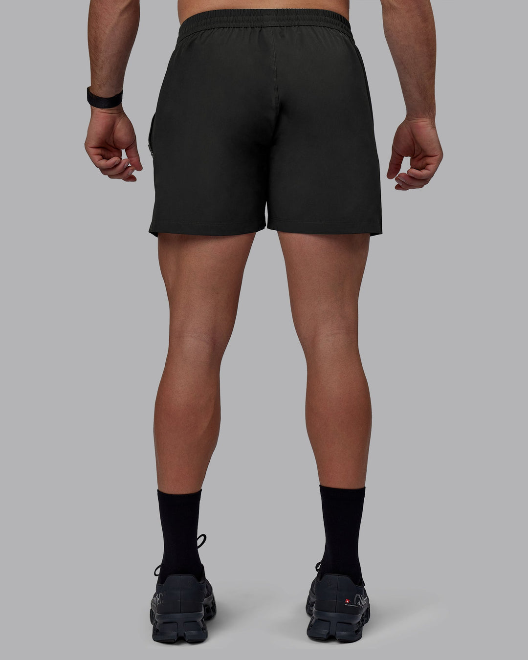 Man wearing Rep 5&quot; Lined Performance Shorts - Pirate Black