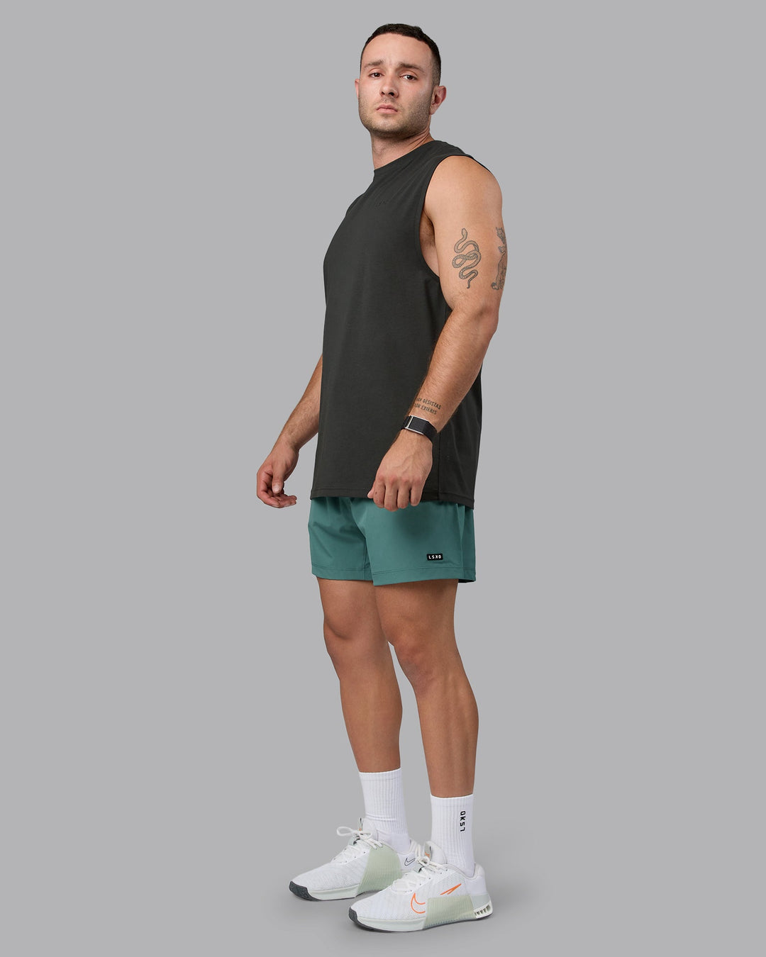 Man wearing Rep 5&quot; Lined Performance Shorts - Sagebrush