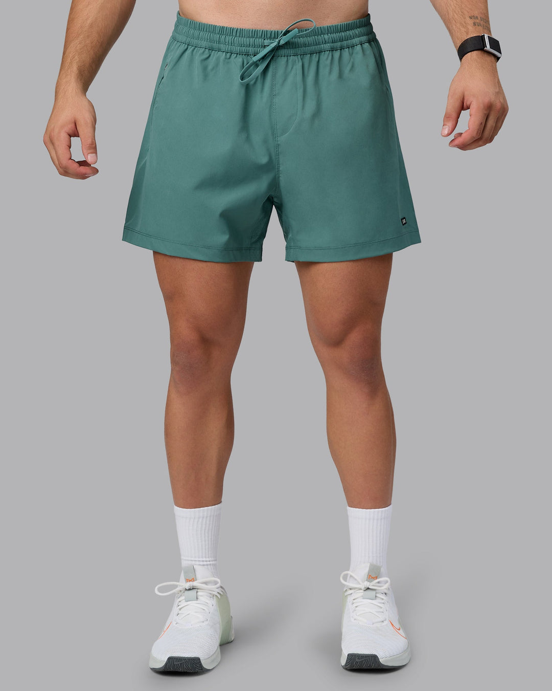 Man wearing Rep 5&quot; Lined Performance Shorts - Sagebrush