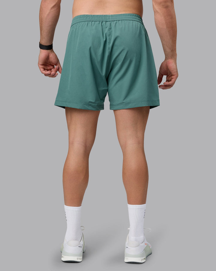 Man wearing Rep 5&quot; Lined Performance Shorts - Sagebrush
