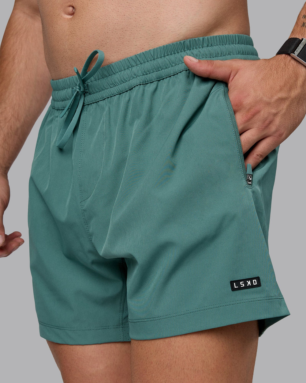 Man wearing Rep 5" Lined Performance Shorts - Sagebrush