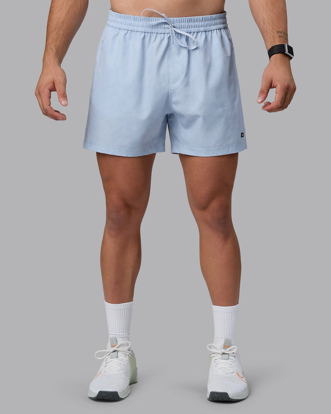 Man wearing Rep 5&quot; Performance Shorts - Digital Camo Ice Blue