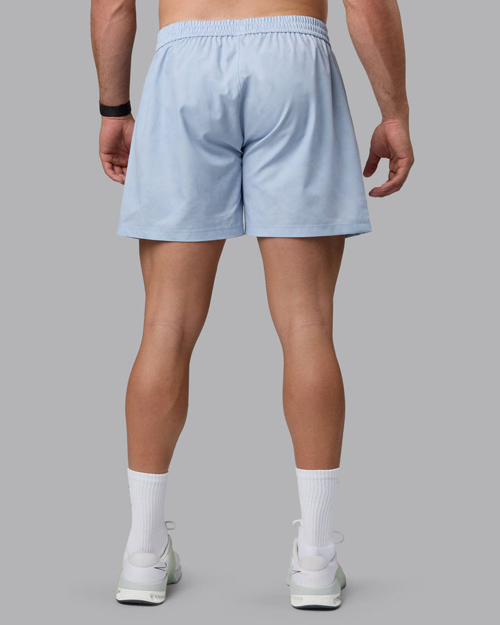 Man wearing Rep 5&quot; Performance Shorts - Digital Camo Ice Blue
