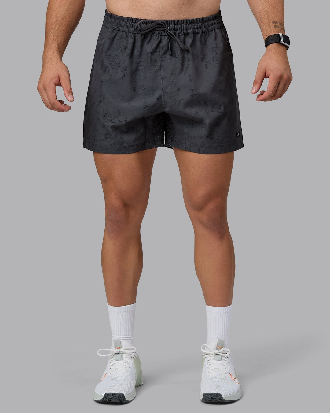 Man wearing Rep 5&quot; Performance Shorts - Digital Camo Pirate Black