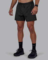 Man wearing Rep 5" Performance Shorts - Pirate Black