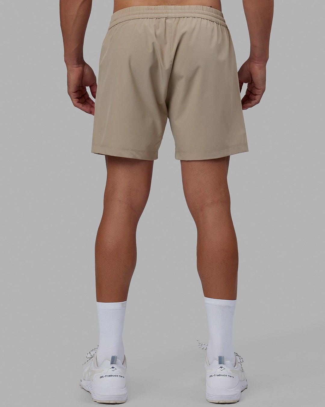 Man wearing Rep 5'' Performance Short - Taupe