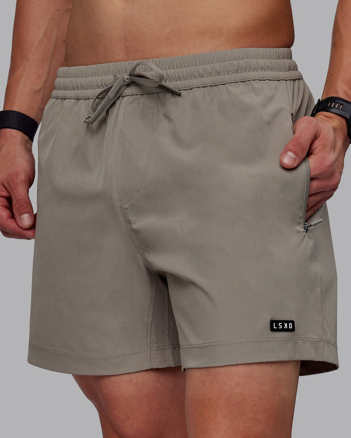 Man wearing Rep 5&quot; Performance Shorts - Elephant
