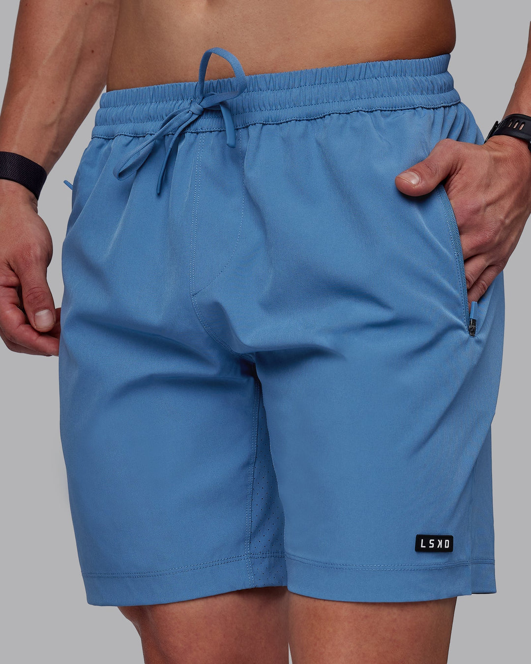 Man wearing Rep 7&quot; Performance Shorts - Elemental Blue