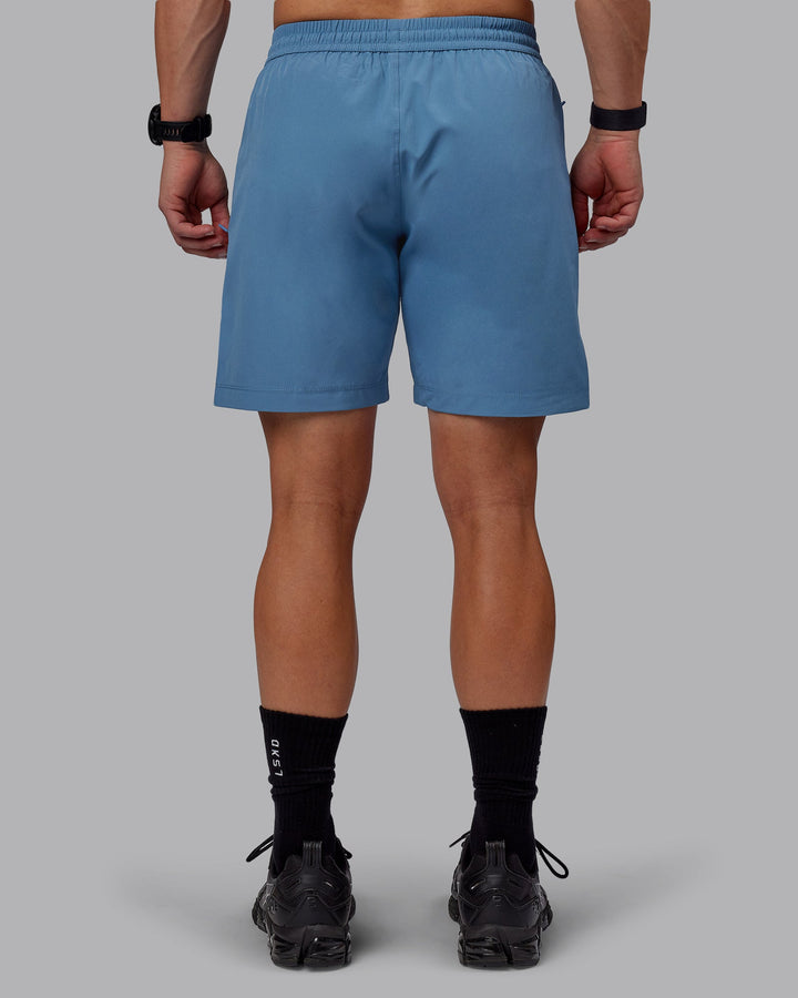 Man wearing Rep 7&quot; Performance Shorts - Elemental Blue
