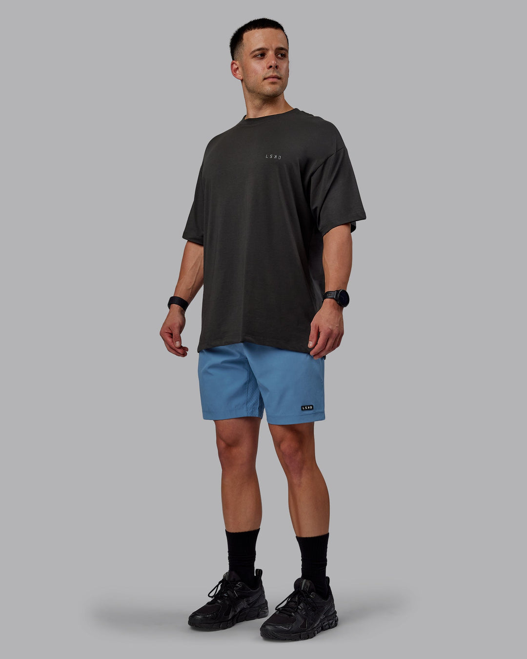 Man wearing Rep 7&quot; Performance Shorts - Elemental Blue