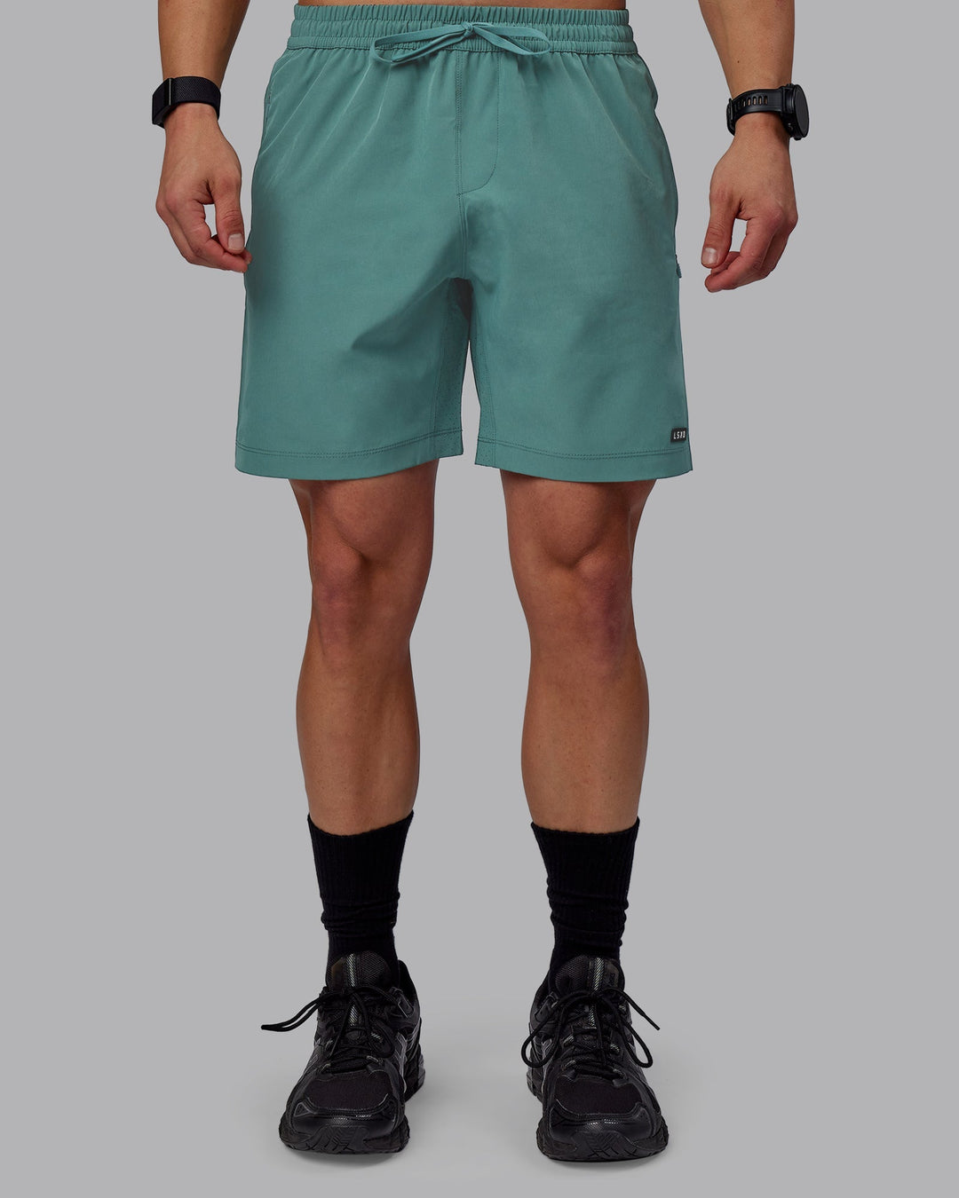 Man wearing Rep 7&quot; Performance Shorts - Sage Bush