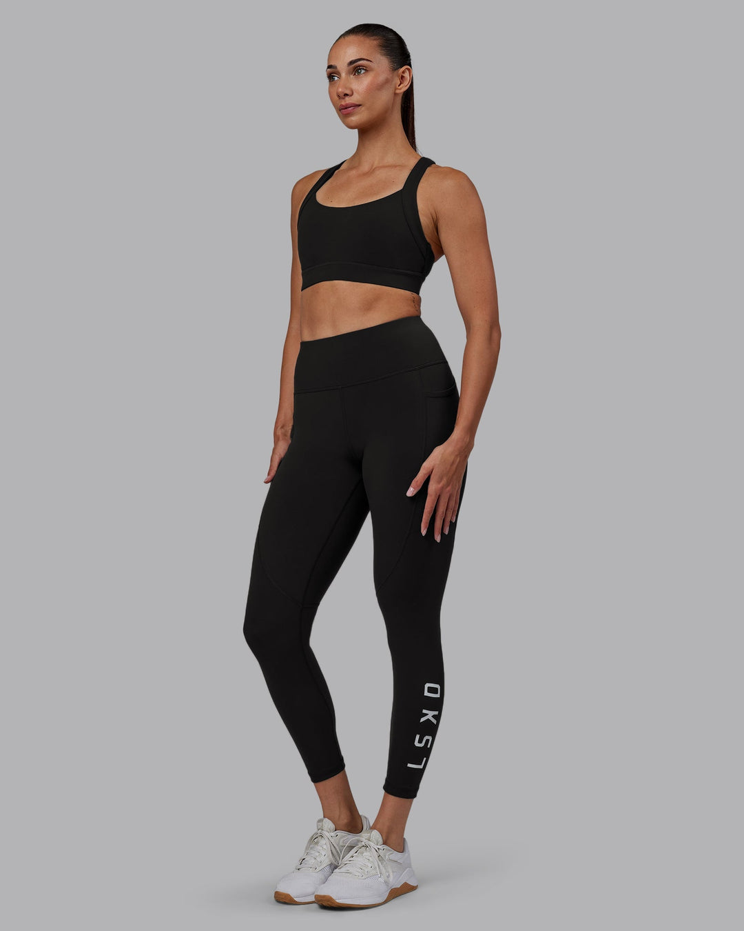 Woman wearing Rep 7/8 Length Leggings - Pirate Black-White