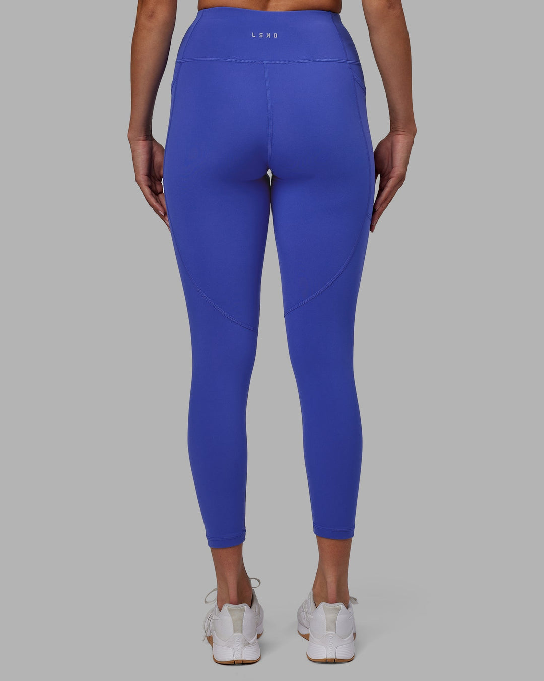 Woman wearing Rep 7/8 Length Leggings - Power Cobalt-White