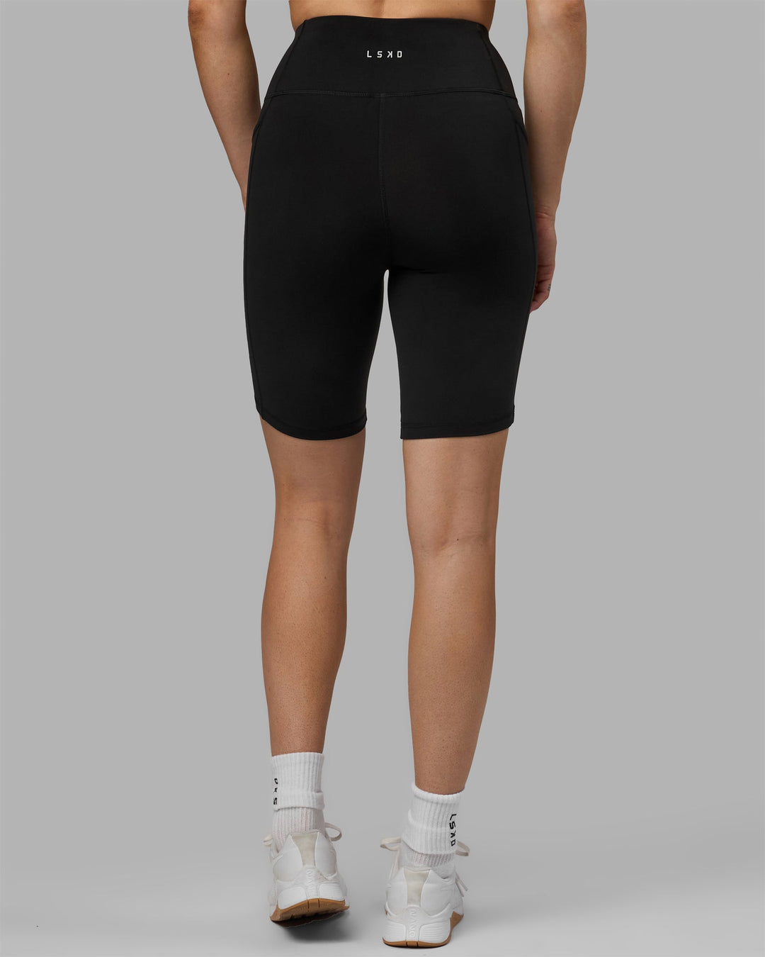 Woman wearing Rep Bike Shorts - Black-Black