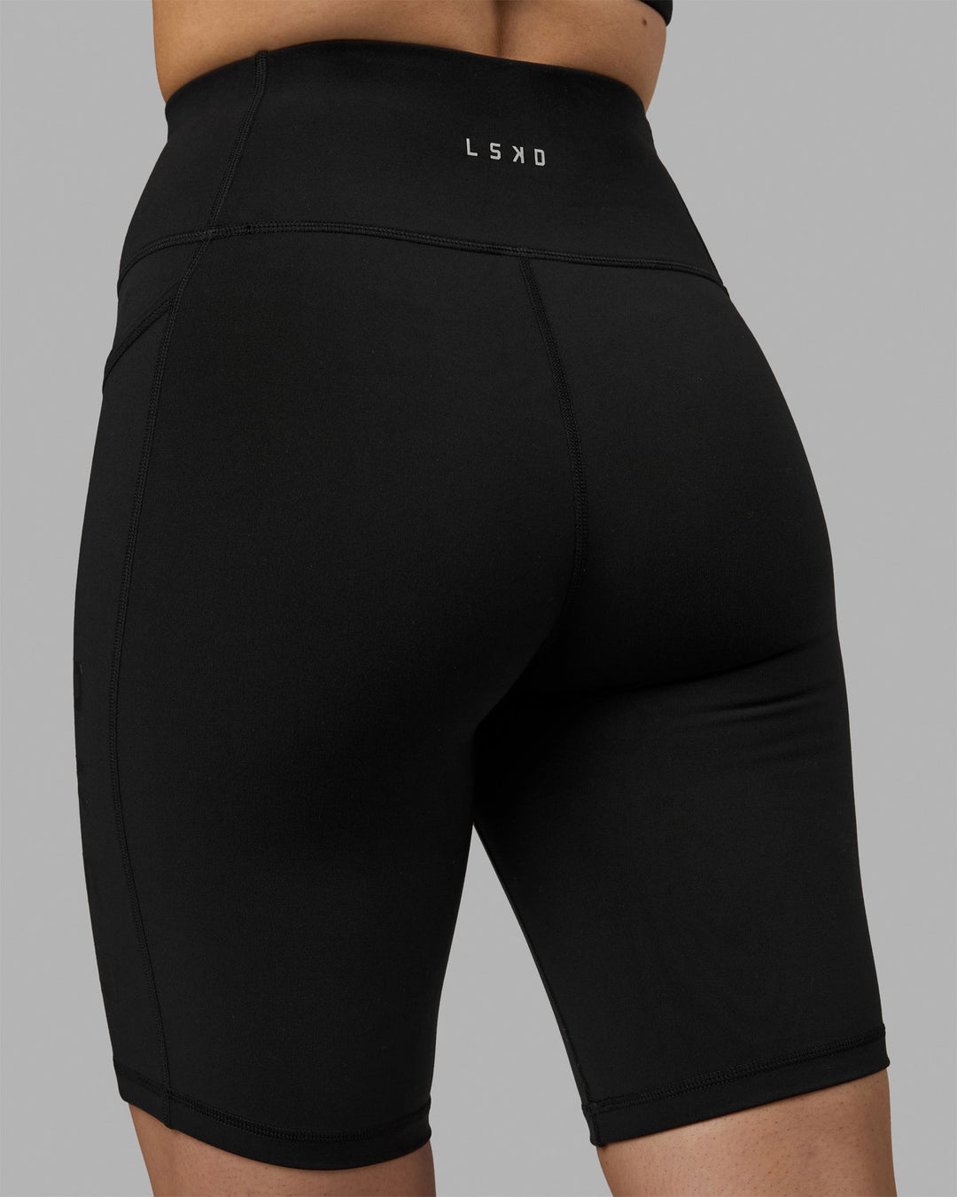 Woman wearing Rep Bike Shorts - Black-Black