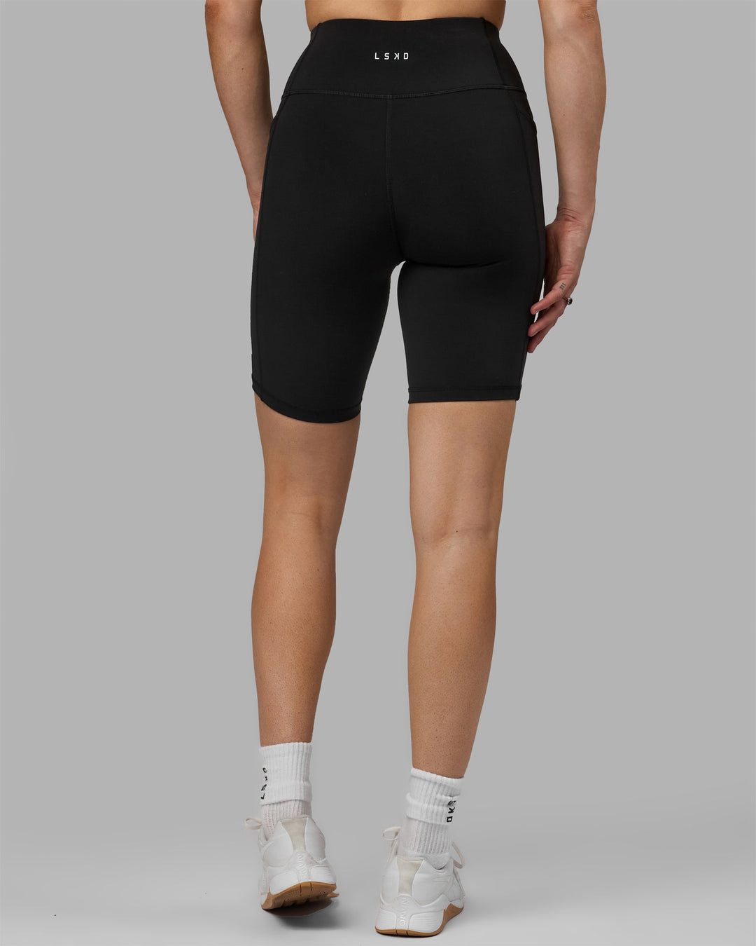 Woman wearing Rep Bike Shorts - Black-White