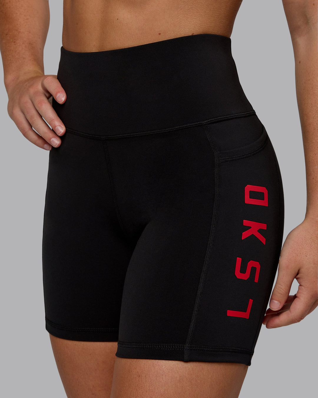 Woman wearing Rep Mid Short Tights - Black-Crimson