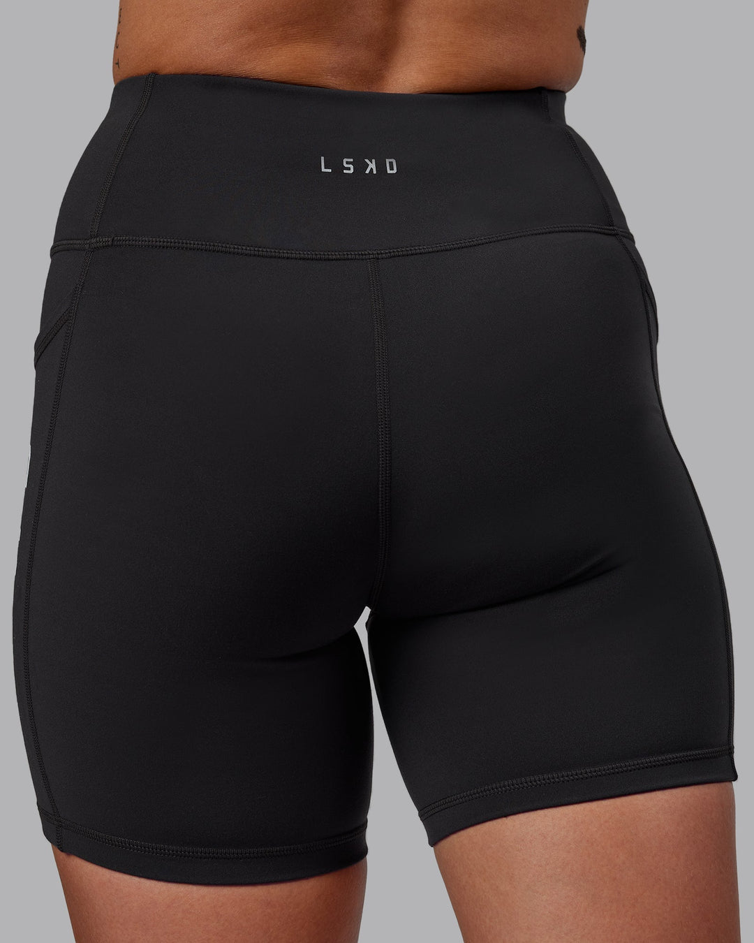 Woman wearing Rep Mid-Length Shorts - Pirate Black-White