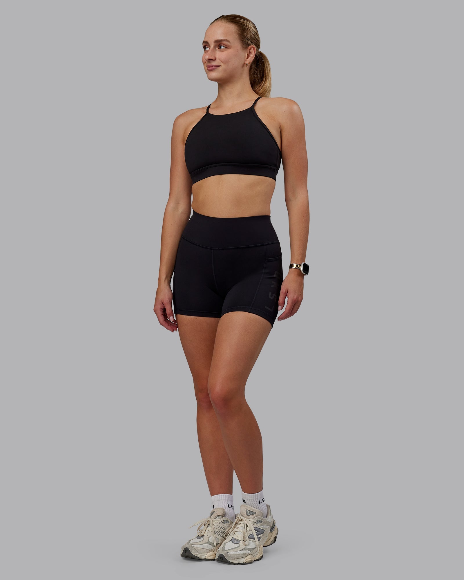 Woman wearing Rep Ultra High-Rise 4" Short Pockets - Black-Black