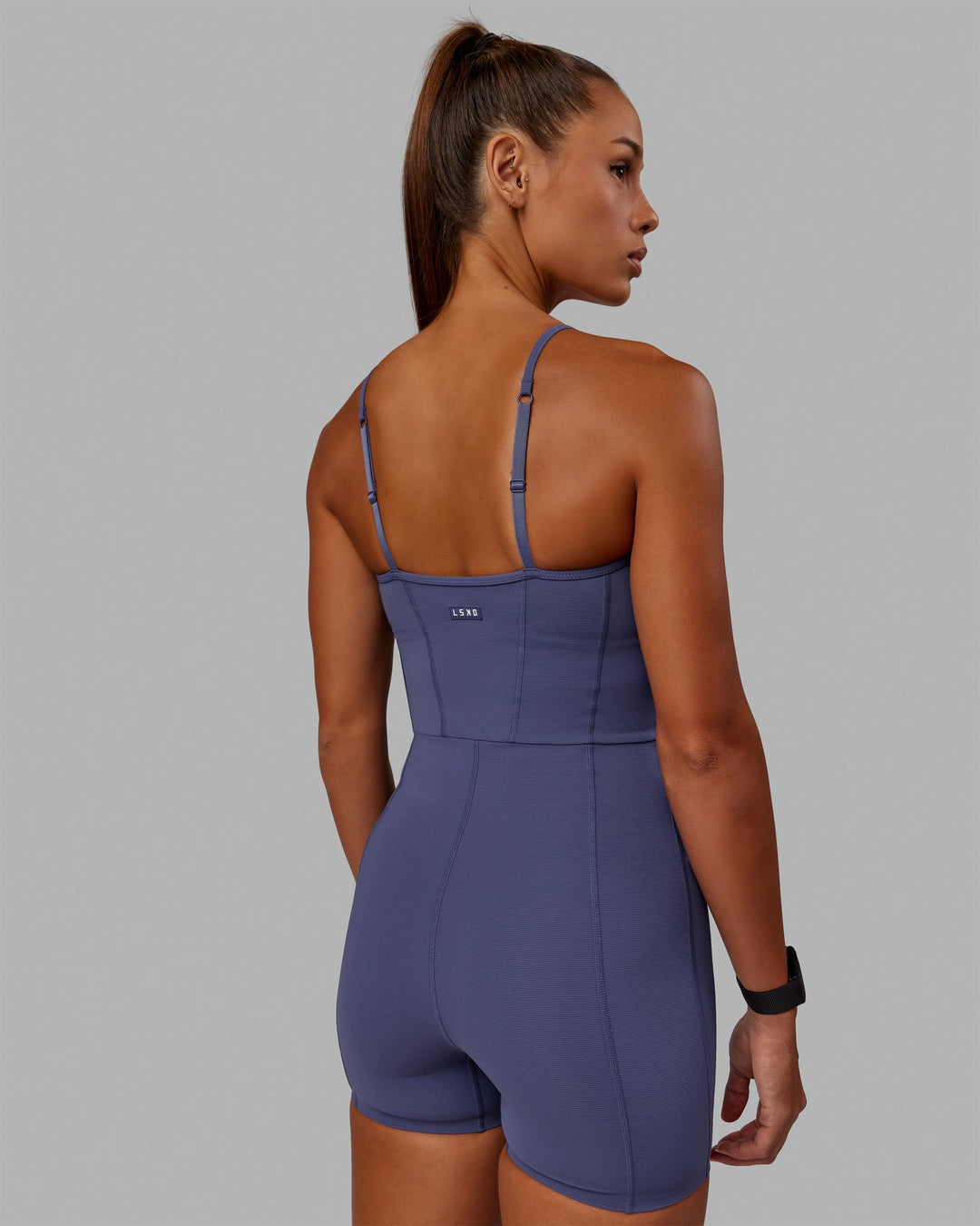 Woman wearing Resistance Ribbed Bodysuit - Future Dusk