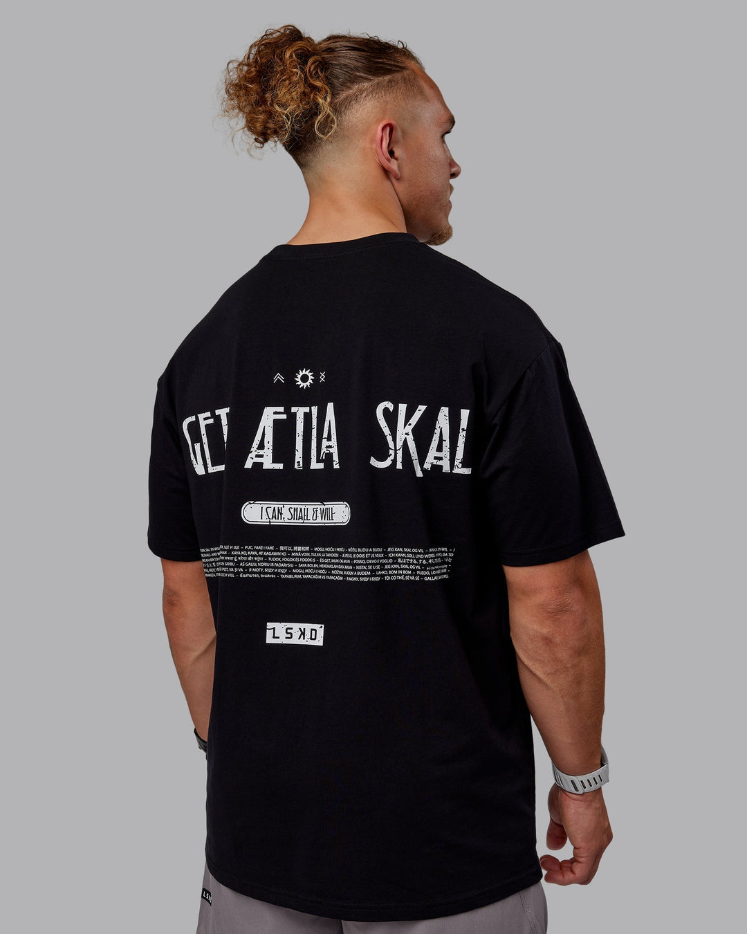 Man wearing Sara GET ÆTLA SKAL Unisex FLXCotton Oversize Tee - Black-White