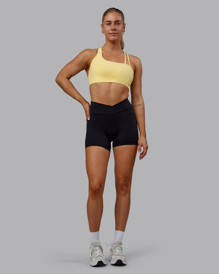 Woman wearing Sara Helios Sports Bra - Sunflower
