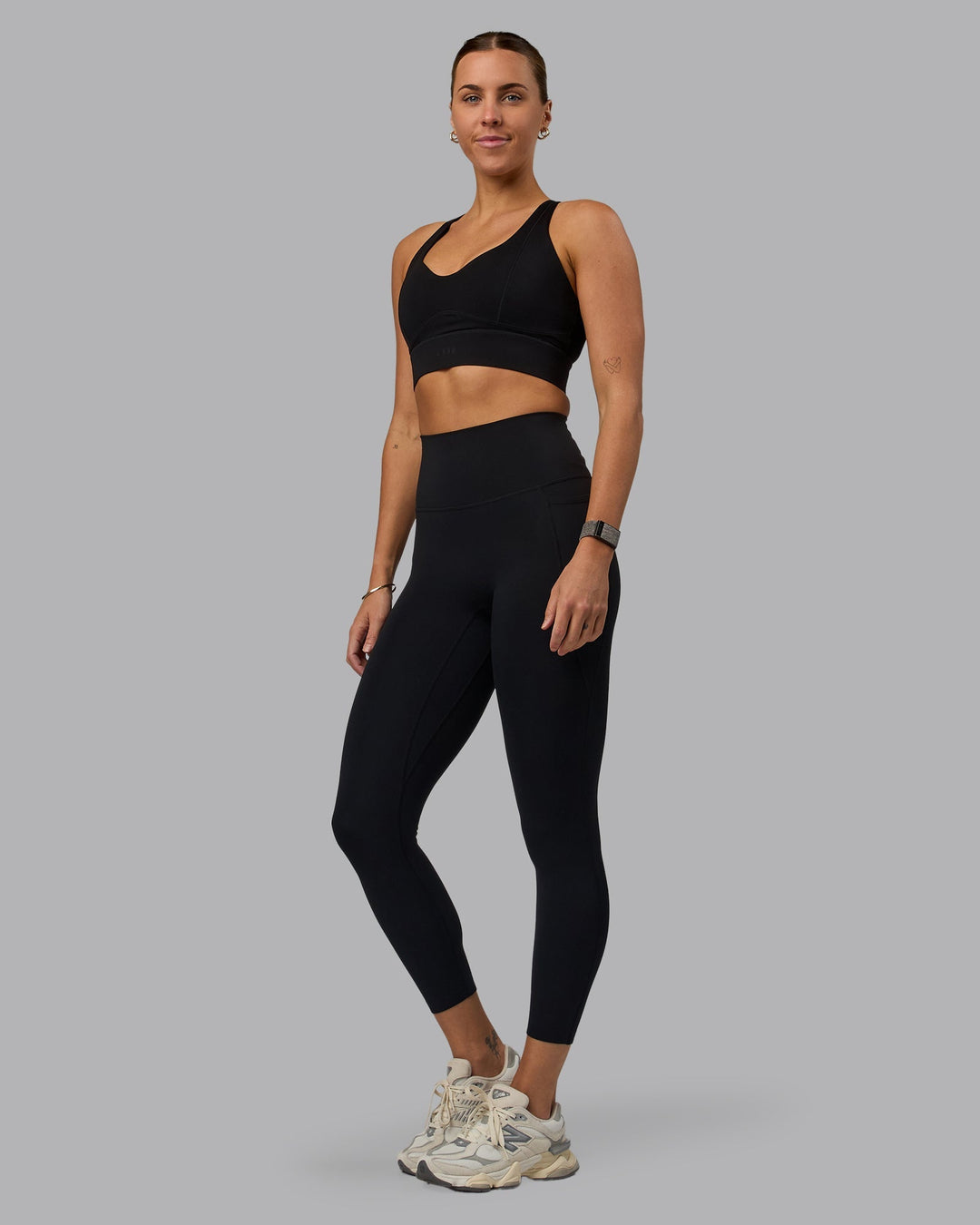 Woman wearing Sculpt Sports Bra - Black