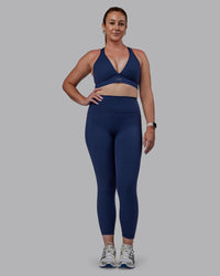 Woman wearing Stamina Sports Bra (D/DD/E) - Future Navy | Model:Tegan | Size:M