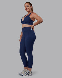 Woman wearing Stamina Sports Bra (D/DD/E) - Future Navy | Model:Tegan | Size:M