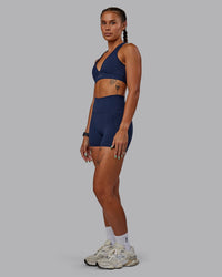 Woman wearing Stamina Sports Bra - Future Navy | Model:Vanessa | Size:S