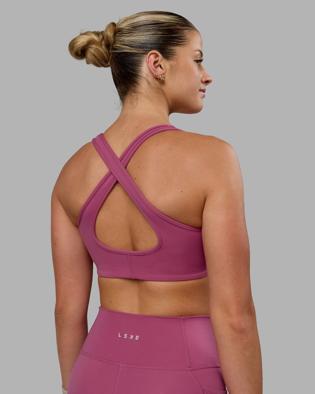 Woman wearing Stamina Sports Bra - Mauve Haze