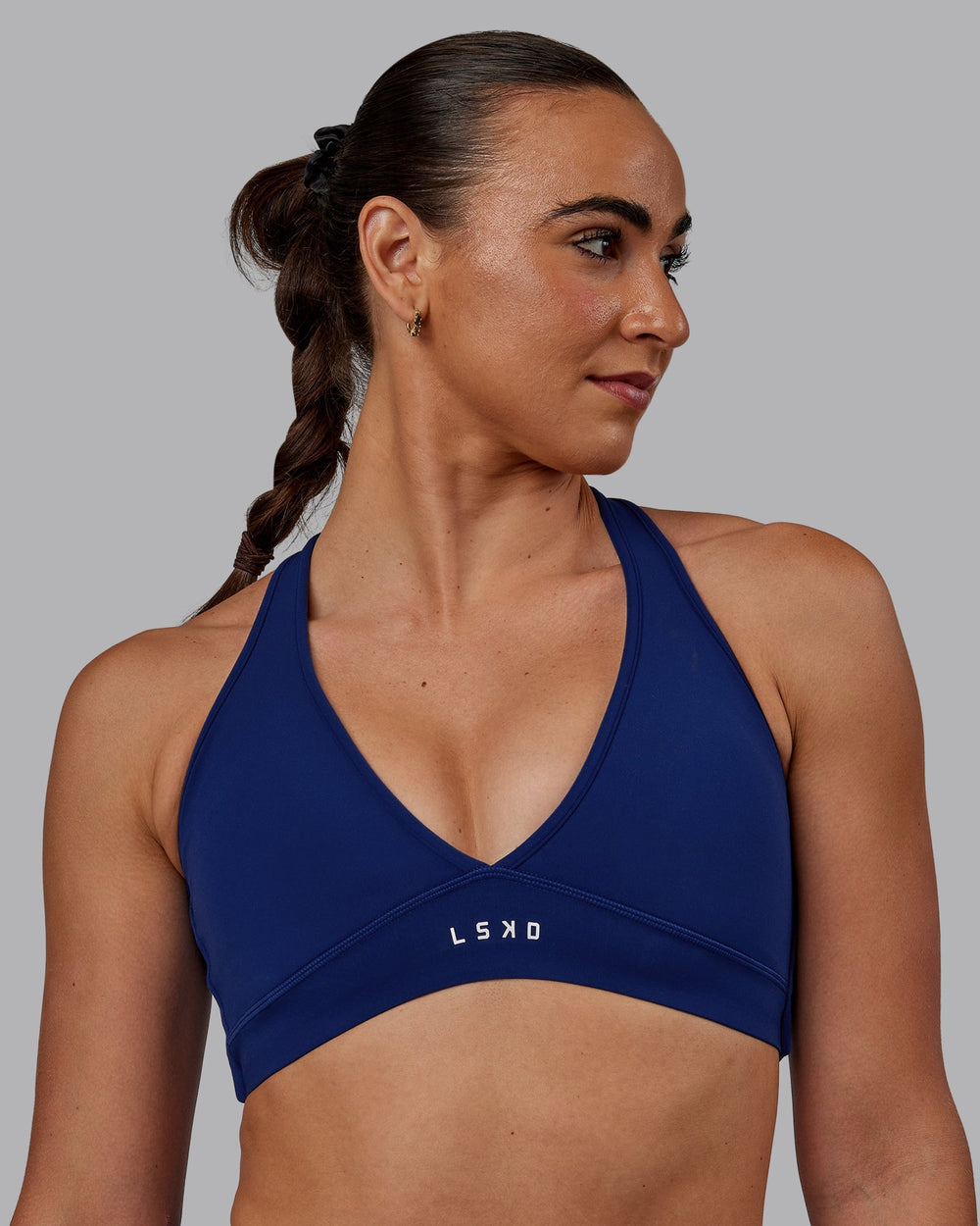 Woman wearing Stamina Sports Bra - Midnight Blue