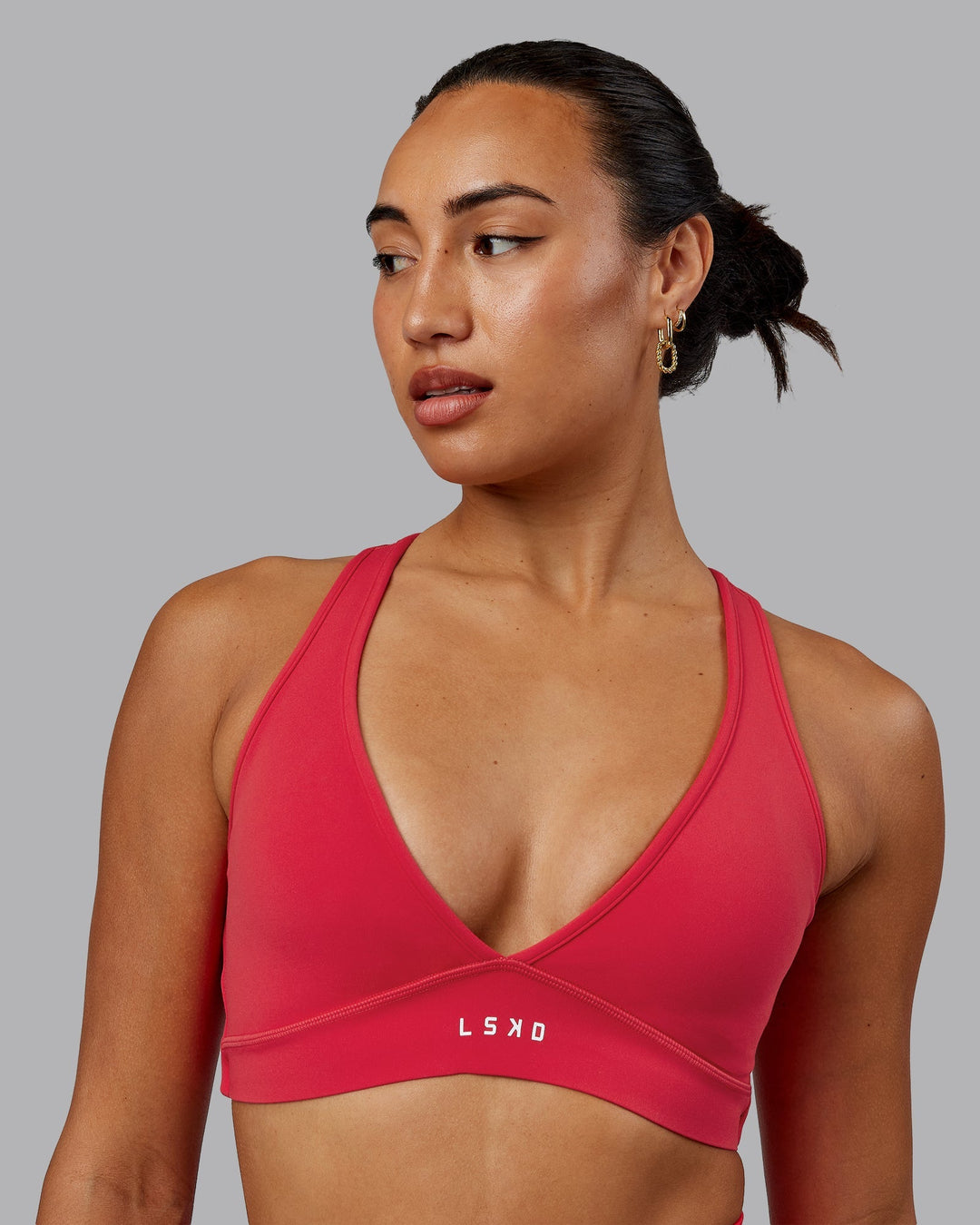 Woman wearing Stamina Sports Bra - Scarlet