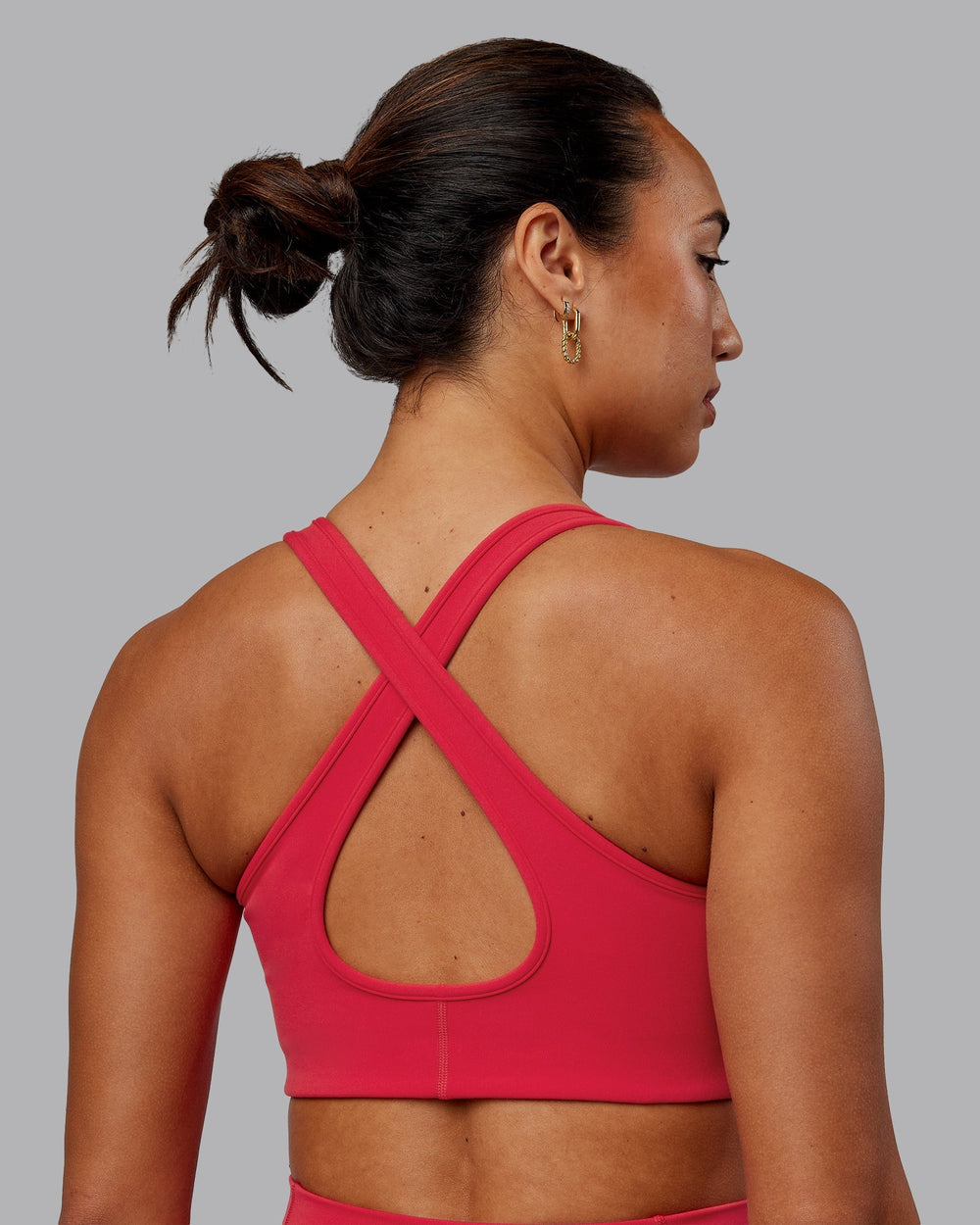 Woman wearing Stamina Sports Bra - Scarlet