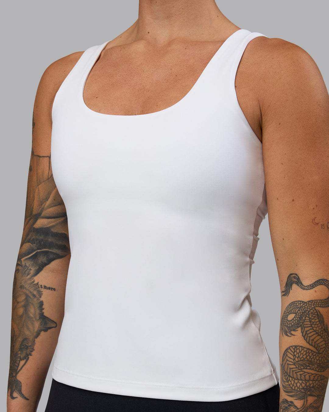 Woman wearing Staple Active Shelf Bra Tank - White