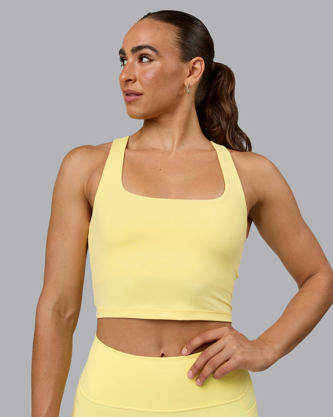 Woman wearing Staple Square Neck Active Shelf Bra Tank - Lemon