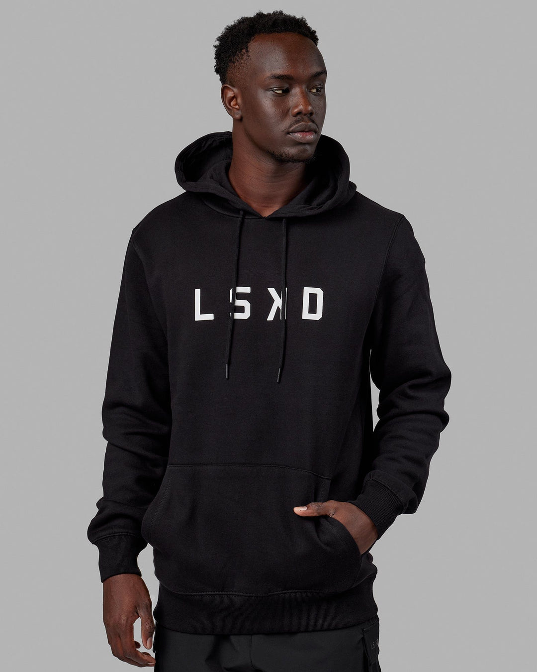 Man wearing Unisex Structure Hoodie - Black-White