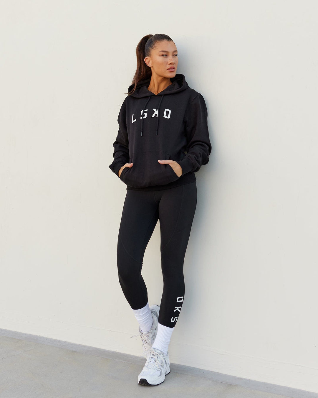 Woman wearing Unisex Structure Hoodie - Black-White