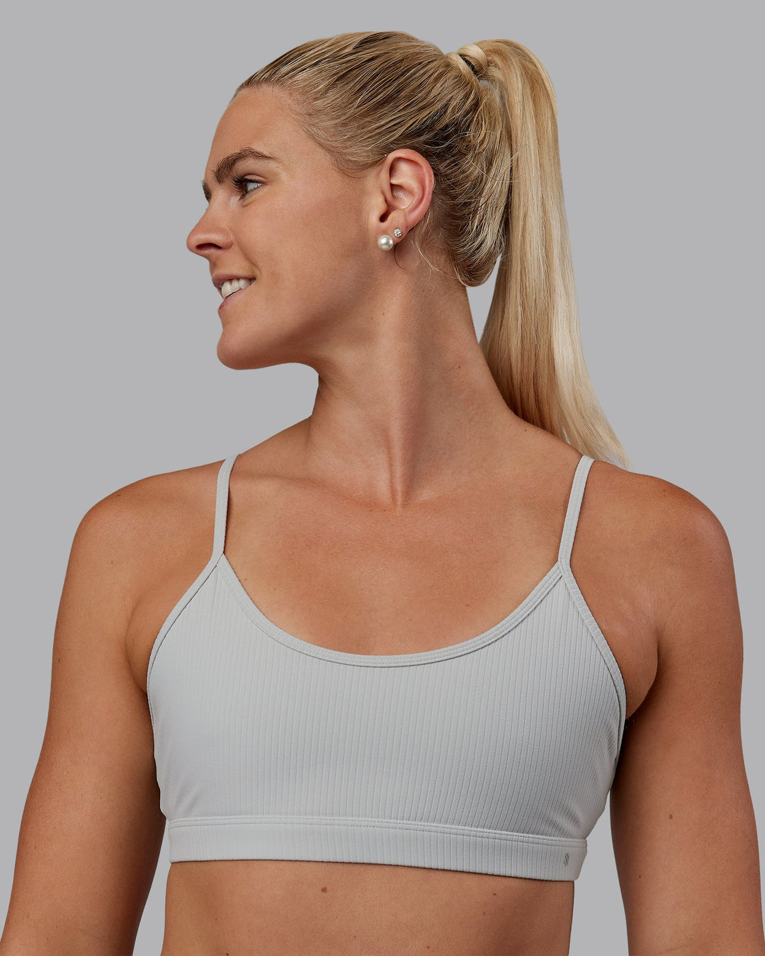 Woman wearing Tenacity Ribbed Lounge Bra - Light Grey Marl