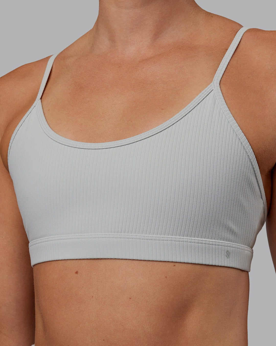 Woman wearing Tenacity Ribbed Lounge Bra - Light Grey Marl